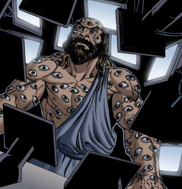A comic-style illustration of a bearded figure whose skin is covered entirely in eyes, standing among multiple monitors.
