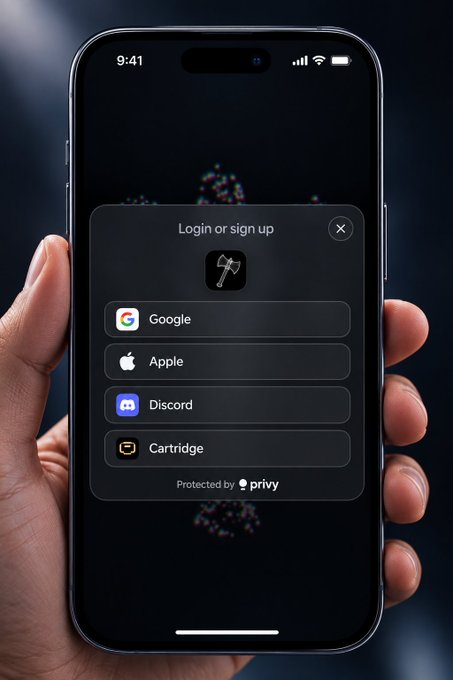 A hand holding a smartphone displaying a login screen with options for Google, Apple, Discord, and Cartridge, protected by Privy.