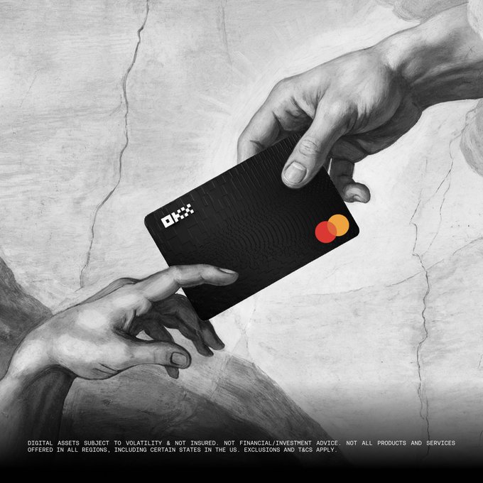 A black-and-white parody of Michelangelo's 'Creation of Adam' where two hands reach toward a black OKX crypto card instead of each other, accompanied by the disclaimer: 'DIGITAL ASSETS SUBJECT TO VOLATILITY & NOT INSURED. NOT FINANCIAL/INVESTMENT ADVICE. NOT ALL PRODUCTS AND SERVICES OFFERED IN ALL REGIONS, INCLUDING CERTAIN STATES IN THE US. EXCLUSIONS AND T&CS APPLY.'