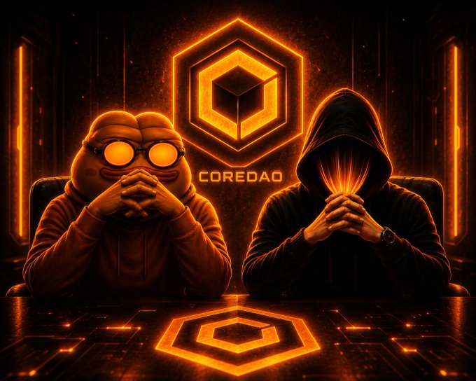 Artwork featuring the 'COREDAO' logo and hexagonal emblem in glowing orange, flanked by a frog character in goggles and a hooded figure with a glowing face, both sitting at a futuristic table.