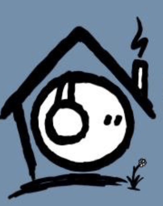 A simple black and white drawing of a sad house with a circular face, a smoking chimney, and a single small flower next to it.