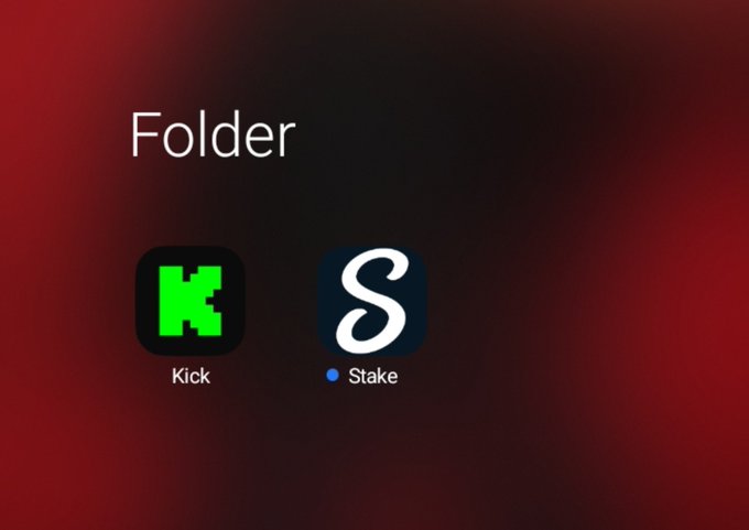 iOS home screen folder titled 'Folder' containing two streaming app icons: Kick (green K logo) and Stake (dark blue S logo with blue dot).
