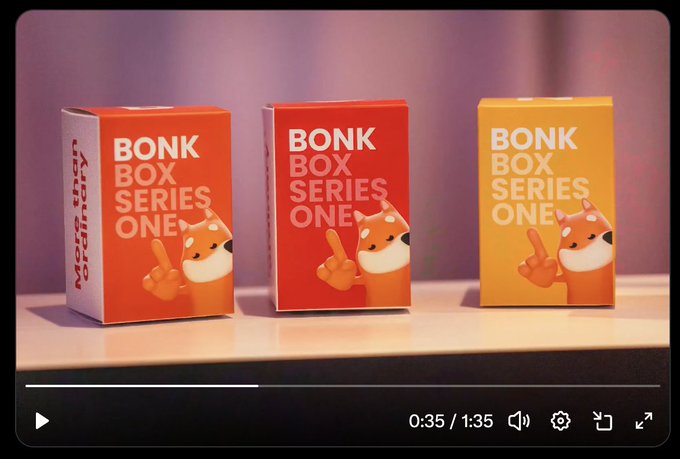 Three "BONK BOX SERIES ONE" blind boxes in red and orange colors are displayed on a white surface, each featuring the iconic Shiba Inu dog mascot pointing a finger, connecting to the post's mention of a "familiar dog" referencing the BONK cryptocurrency mascot in a collection recap.