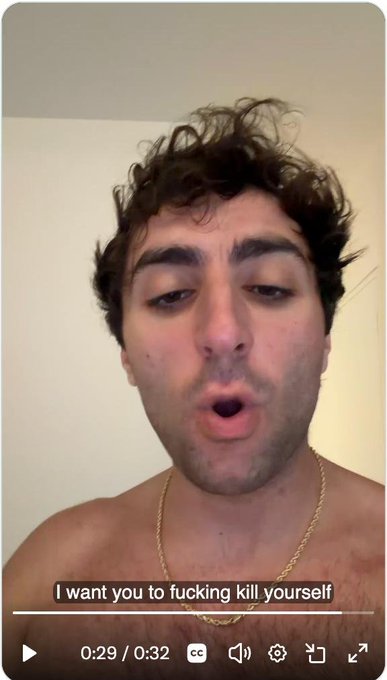A shirtless young man with curly dark hair and a gold chain speaks directly to camera in a video clip, with the caption "I want you to fucking kill yourself" displayed on screen. The accompanying post from @rasmr_eth highlights this as an example of an affiliate aggressively targeting people who object to scamming.