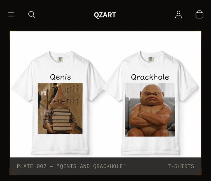 A QZART online store displaying two white t-shirts: 'Qenis' featuring a gnome holding books, and 'Qrackhole' featuring a muscular baby, labeled as 'PLATE 007 - "QENIS AND QRACKHOLE" T-SHIRTS'.