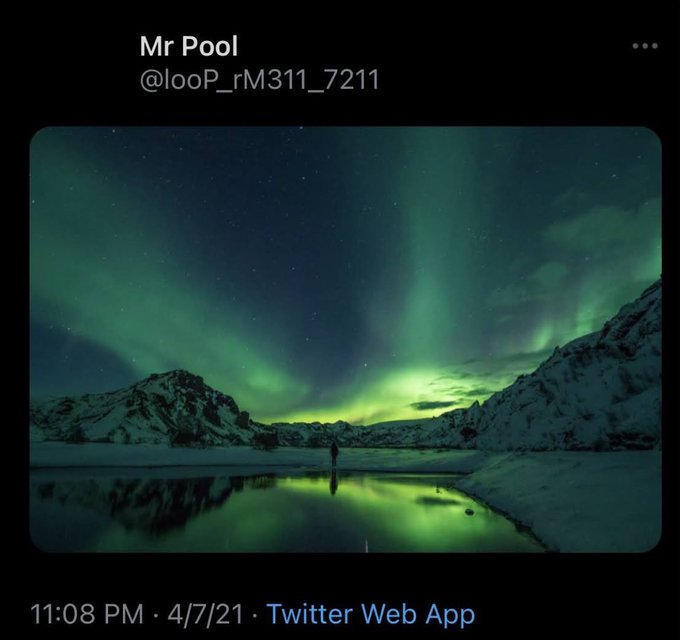 A stunning night landscape featuring the green aurora borealis dancing across a starry sky above snow-capped mountains and a reflective lake, posted by user "Mr Pool" (@looP_rM311_7211) on Twitter at 11:08 PM on 4/7/21, with the caption "Follow the Green Light" symbolizing the aurora as a guiding beacon.