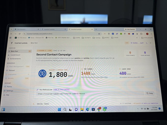 A laptop screen displays the "Inverted Lambda" platform's Beta Test page showing a "Second Contact Campaign" with a Season 2 Reward Pool of 1,800 USDC, top score of 1,400 USDC, and lucky draw of 400 USDC. The interface shows the platform is still in early beta testing with the campaign ending soon, matching the post's mention of a 3-day beta period.