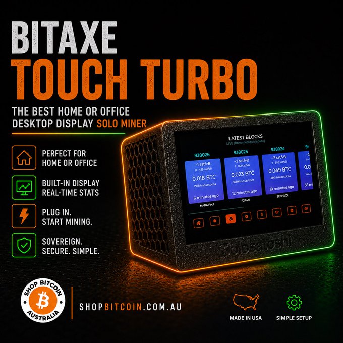 Advertisement for the BITAXE TOUCH TURBO solo Bitcoin miner, displayed as a desktop device with a touchscreen showing 'LATEST BLOCKS' data, marketed via SHOPBITCOIN.COM.AU and made in USA.