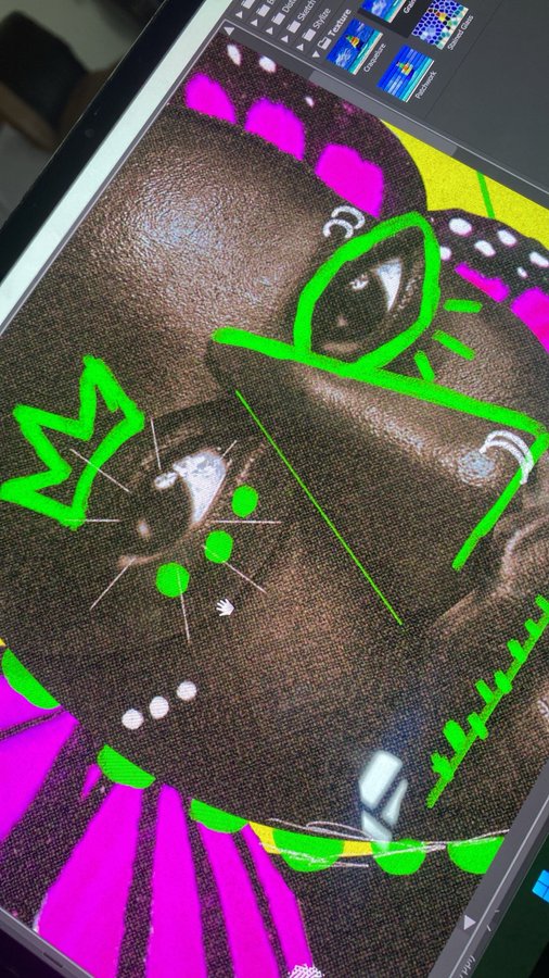 A laptop screen displaying a Photoshop workspace with a stylized digital portrait featuring bold green linework, magenta accents, and yellow highlights over a dark photographic base.