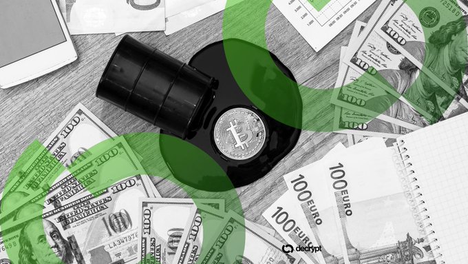 A black and white image of a Bitcoin token resting on scattered $100 bills and 100 Euro notes, overlaid with a green 3D logo and watermarked with the 'decrypt' logo.