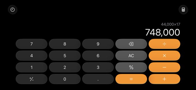 A dark-themed iOS calculator app displaying the result "748,000" for the calculation "44,000×17" at the top of the screen, with standard number and operator buttons below.