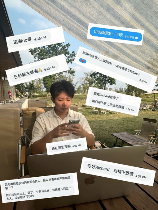 A young man sits outdoors under a canopy at 4:39 PM, focused on his phone and laptop while surrounded by WeChat message bubbles from "Ric" discussing Gate.io referrals, UID coordination, and community greetings—visually illustrating the post's description of him diligently handling community member requests and internal referrals during the Mid-Autumn Festival.