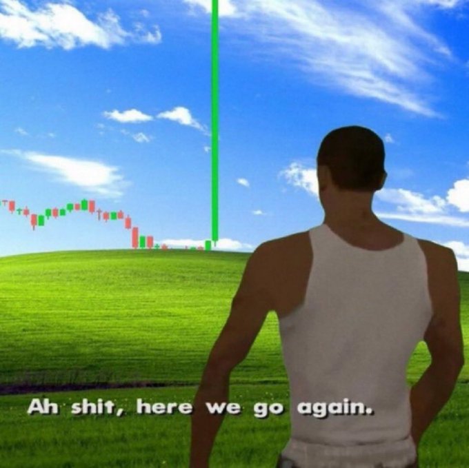 A meme featuring a man in a white tank top looking at a Windows XP 'Bliss' style landscape with a large green candlestick rising from a chart, captioned 'Ah shit, here we go again.'