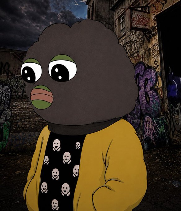 Cartoon character with a brown afro, large eyes, and pink lips wearing a yellow jacket over a black shirt with white skull patterns, standing in front of a graffiti-covered urban wall.