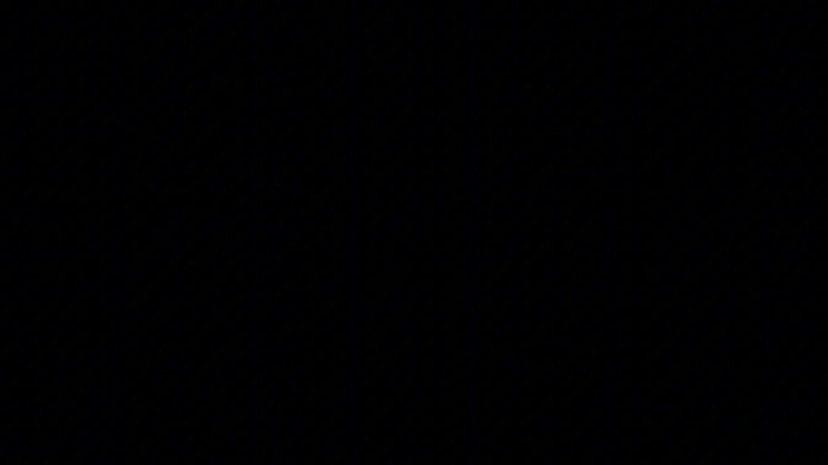 The image shows a black square with white lines running through it. The background of the image is gray. There are no texts or other objects present in the image.