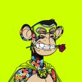 A cartoon-style monkey wearing a green headband with red roses and covered in colorful tattoos grins smugly while a pipe hangs from its mouth, fitting the celebratory tone of the post congratulating "Mac do" holders on their gains.