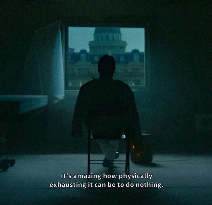 A silhouetted figure sits in a dimly lit room facing the U.S. Capitol building, with the caption "It's amazing how physically exhausting it can be to do nothing."

The image illustrates the mental strain of waiting through quiet market periods—reinforcing the post's message that forced action during boredom, rather than bear markets themselves, is what destroys trading accounts.