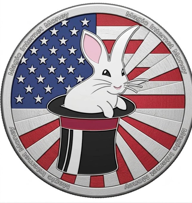 A silver commemorative coin featuring a white rabbit emerging from a black magician's top hat, set against an American flag background with "Magic Internet Money" inscribed around the edge.