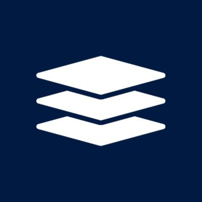 The image displays a white isometric stack/layers icon on a dark navy blue background, symbolizing layered technology or stacked protocols. It visually represents the multi-tiered verification system Flare provides, where its Confidential Compute on Songbird serves as one layer that checks and confirms USDX stablecoin reserves held by Hex Trust, ensuring the backing is transparent and verifiable.