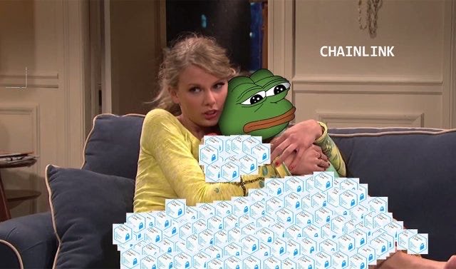 Taylor Swift hugs a Pepe the Frog plushie while sitting behind a massive pile of Amazon boxes, with "CHAINLINK" labeled on the frog's head, humorously illustrating the post's message about expanding crypto holdings into Chainlink ($LINK) solutions.