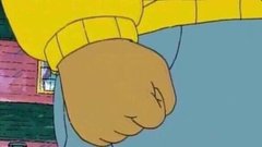 A close-up image of the classic "Diamond Hands" GIF showing two hands clasped together, wearing a yellow sweater and blue pants, famously associated with r/WallStreetBets. The image appears to be a still from the widely shared meme that has since been adopted by the White House.