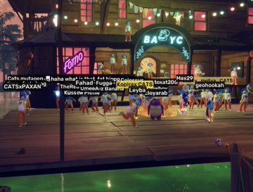 A virtual boardwalk scene at night with neon signs including 'BANG' and 'Tomo', populated by colorful cartoon characters and an overlaid text chat with usernames like 'iCats' and 'loxa120'.