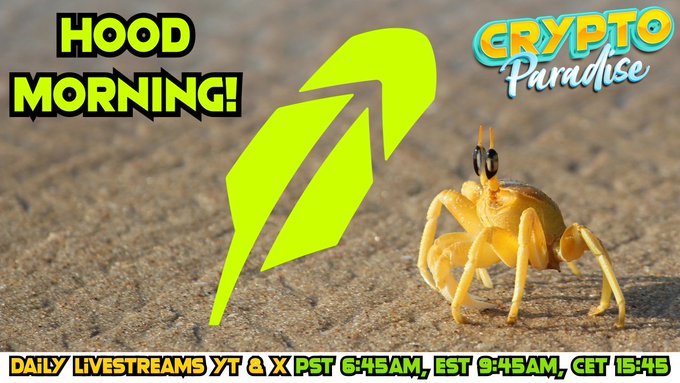 The image shows a sandy-toned crab paired with a neon green uptrend arrow, branded with "HOOD MORNING!" and "Crypto Paradise" logos. Text along the bottom advertises "Daily Livestreams YT & X PST 6:45AM, EST 9:45AM, CET 15:45," promoting Robinhood Crypto's live stream series that ties into the bullish crab-themed "Hood Morning" hype.
