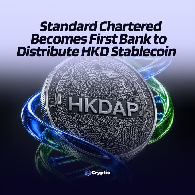 The image displays a headline reading "Standard Chartered Becomes First Bank to Distribute HKD Stablecoin," paired with a stylized silver digital coin featuring "HKDAP" engraving, surrounded by glowing blue and green orbital rings. The visual directly corresponds to the accompanying news, illustrating Standard Chartered's milestone as the first bank to distribute the Anchorpoint-issued Hong Kong dollar stablecoin to institutional clients.