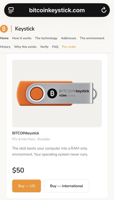 Mobile screenshot of bitcoinkeystick.com showing a product page for a BITCOIN keystick that boots a computer into a RAM-only environment, priced at $50.