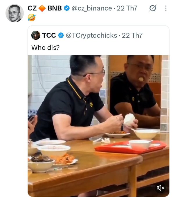 A screenshot of a tweet from CZ (referencing BNB) quoting a post by TCC that says "Who dis?", showing a video of two men in black polo shirts eating at a restaurant.