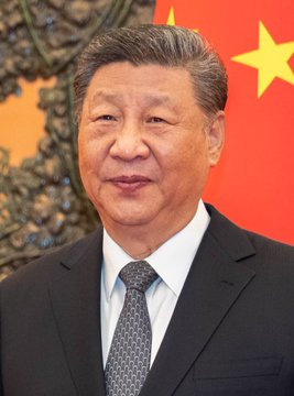 This image shows Xi Jinping, the leader of China, which relates to the post discussing China pumping ¥967 billion in liquidity into the market, stated to be bullish for crypto like #SOLANA.