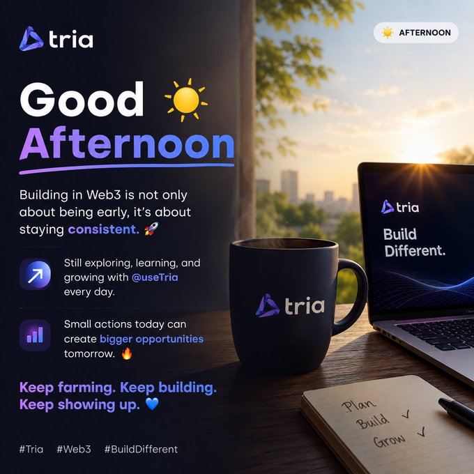 The image features a laptop computer sitting on top of a wooden table, along with a mug filled with coffee next to it. The background shows a city skyline at sunset, creating a serene atmosphere. Below these elements, there's an advertisement for Tria that promotes the idea of "Good Afternoon" and encourages people to build their own website using Web3.