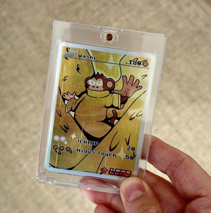A hand holding a custom Pokémon-style trading card featuring a monkey character named 'Washi' with the move 'CHIMP', stats showing 20/58, and a 'LEND' logo at the bottom.