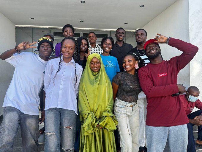 A group of smiling students pose together at LASU after a collaborative blockchain event with Solana and College XYZ, capturing the excitement and community spirit from the educational session.