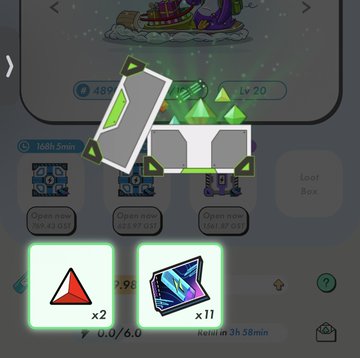 A mobile game interface showing rewards including two red triangles and eleven blue crystals, with a green mechanical figure displayed at the top.