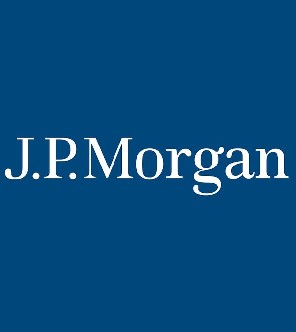 The image displays the "J.P.Morgan" logo in white text on a solid blue background, representing the financial institution mentioned in the post about JPMorgan Chase ($JPM) exploring a stablecoin launch alongside other major banks including Bank of America ($BAC), Wells Fargo ($WFC), and Santander ($SAN).