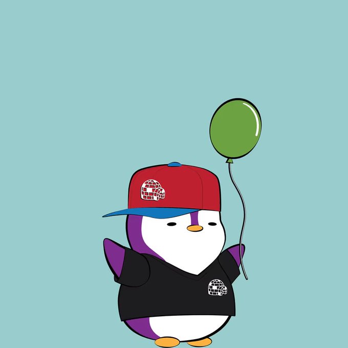A cute penguin-like cartoon character wears a red-and-blue cap and black shirt while holding a green balloon; matching circular emblems appear on the cap and shirt.