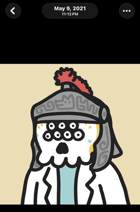 A stylized illustration dated May 9, 2021, showing a skeleton-like figure wearing an ornate gray helmet with a red plume, featuring eight circular eyes and a skull face, resembling a Día de los Muertos warrior.