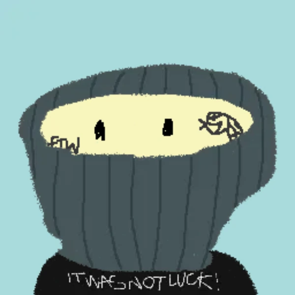 A crudely drawn cartoon figure with a dark hooded sweatshirt obscuring most of its face reveals only two simple eyes, with the caption "IT WAS NOT LUCK!" written below—visually echoing the post's reflection on humble beginnings drawing NFTs for @ftw_collective on just a touchpad and computer.