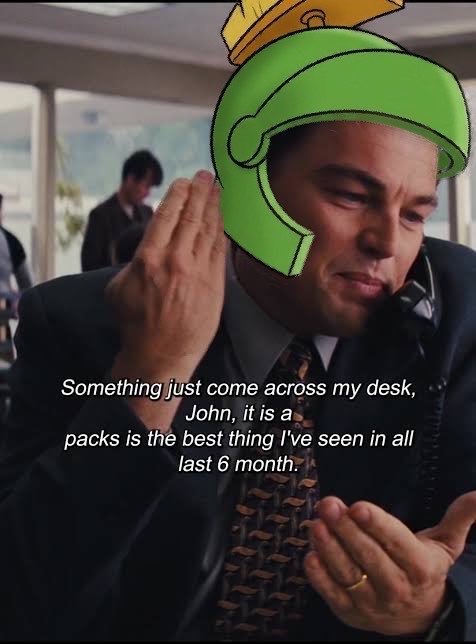 A man in a suit on a phone call with a cartoon helmet sticker over his face, captioned: "Something just come across my desk, John, it is a packs is the best thing I've seen in all last 6 month."
