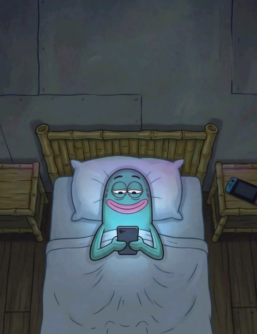 A sleepy fish character from SpongeBob SquarePants (looking like the "sleeping tiktok" meme) lies in bed scrolling on a phone, with a Nintendo Switch resting on the nightstand. The image humorously captures the "one more scroll before bed" mood that crypto traders relate to, reinforcing the late-night "goodnight degens" sentiment of checking markets before sleep.