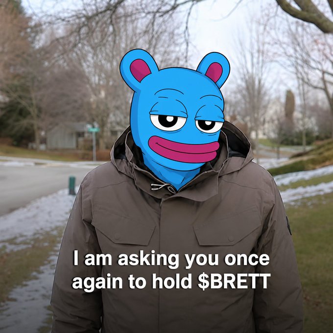 A person in a brown jacket wearing a blue Brett (Brett) meme mask outdoors, with text overlay reading 'I am asking you once again to hold $BRETT'.