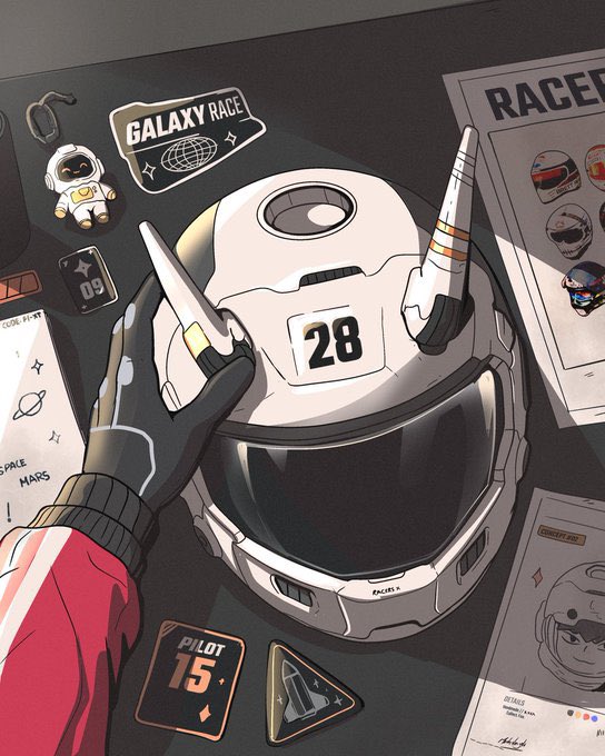 The image features a helmet with the number 28 on it, placed on top of a table surrounded by various items such as stickers, magnets, and other memorabilia. The helmet has two horns on its sides, adding an interesting visual element to the scene. In the background, there is a poster for the Galaxy Race event, which suggests that this image might be related to a racing-themed project or event.