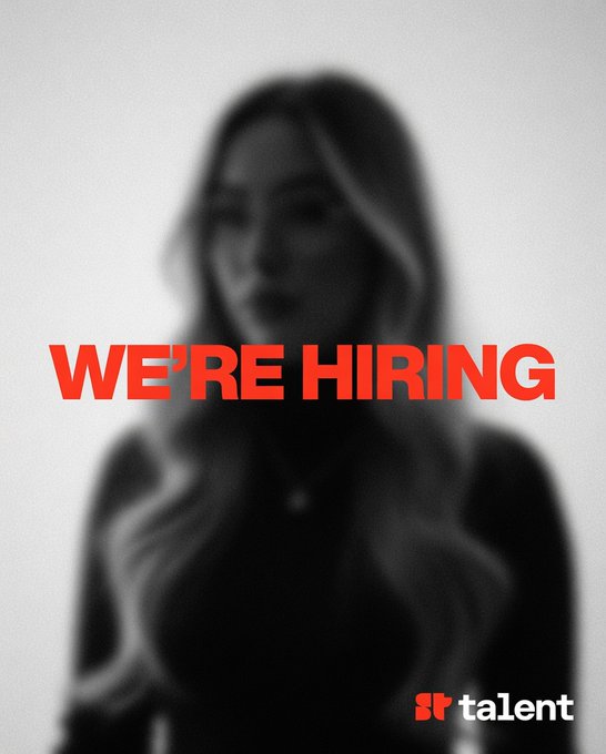 A blurred black-and-white image of a woman with bold red text reading "WE'RE HIRING" overlaid, featuring the Superteam Talent logo in the bottom right corner. The image serves as a recruitment announcement for the Soroban/Rust Smart Contract Specialist role, with the stark "WE'RE HIRING" message directly reinforcing the hiring call-to-action mentioned in the post.