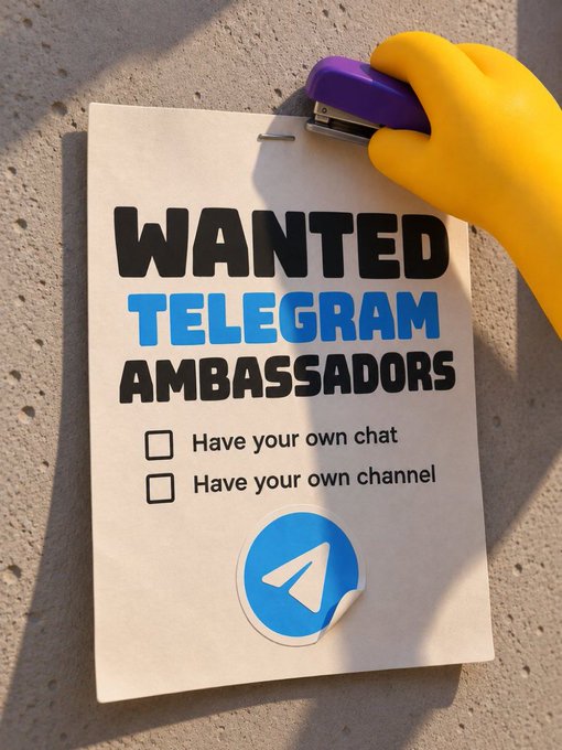 A promotional poster stapled to a textured wall reads "WANTED TELEGRAM AMBASSADORS" with checkboxes for "Have your own chat" and "Have your own channel," featuring the Telegram paper airplane logo, as a hand in a yellow glove holds a purple stapler at the top.