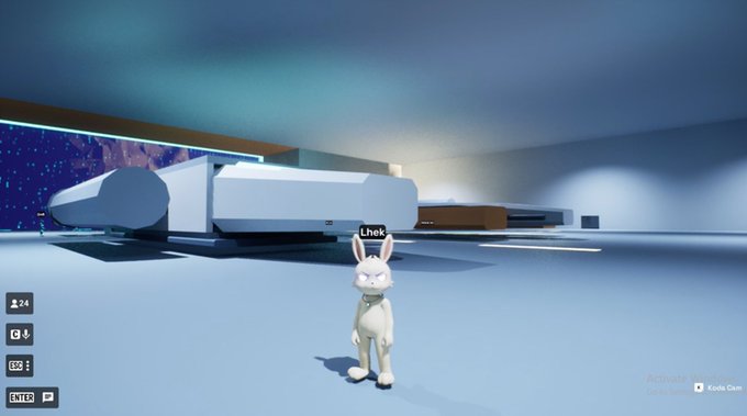 A white rabbit avatar named "Lhek" stands in a futuristic, sci-fi interior space with a large spaceship or pod and starry views, representing a Friday social gathering with Flinkers and ODK build "SPACEFORCE-1" by Hypha.