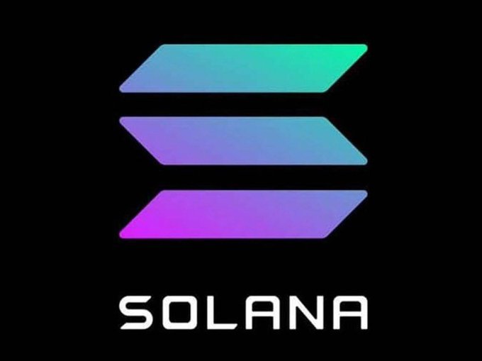 The image displays the Solana logo, featuring three stacked horizontal bars in gradient colors (teal, blue, and purple) above the word "SOLANA" in white text on a black background. This relates to the post as it visually represents the $SOL cryptocurrency being referenced in the giveaway where participants must share their Solana wallet address.