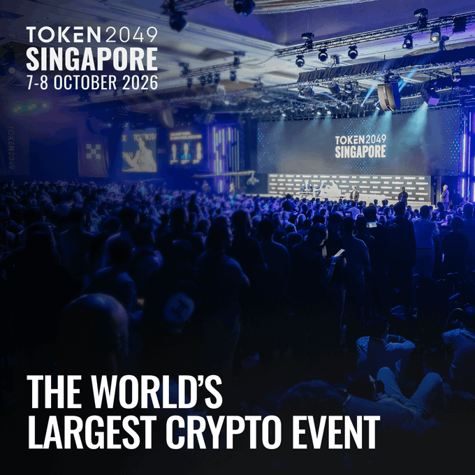 A promotional graphic for TOKEN2049 Singapore (7-8 October 2026) billed as "THE WORLD'S LARGEST CRYPTO EVENT," showing a packed conference hall bathed in blue lighting with attendees gathered before the event's branded stage, visually reinforcing the post's call to action to secure tickets before the 31 July price increase with code ETHERSCAN10.
