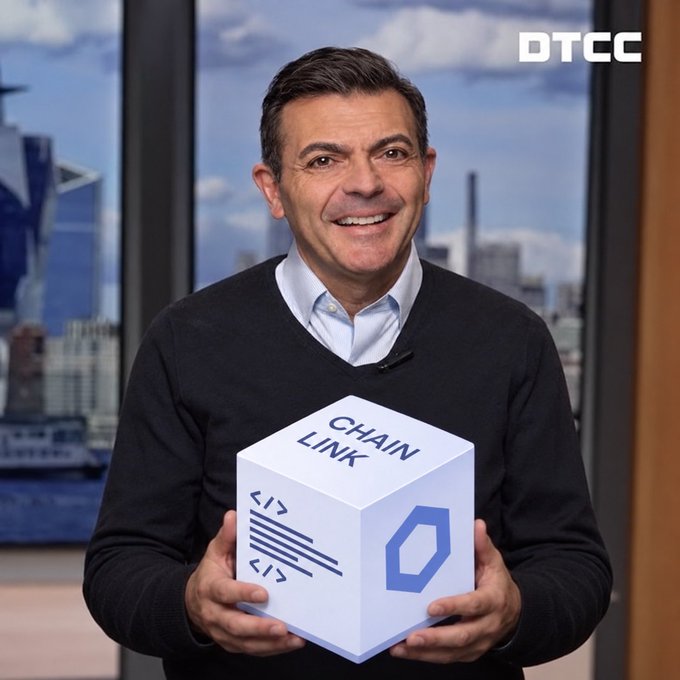 Frank La Salla, President and CEO of DTCC, holds a Chainlink cube marked "CHAIN LINK" in anticipation of his appearance at Chainlink's $LINK:NYC forum at the end of October.