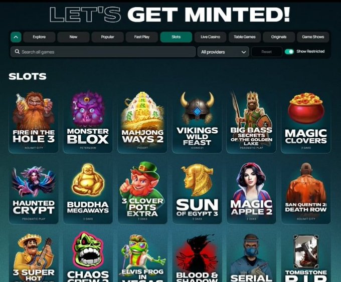 A screenshot of an online casino website titled "LET'S GET MINTED!" displaying a grid of slot games including "Fire in the Hole 3", "Monster Blox", and "Mahjong Ways 2".